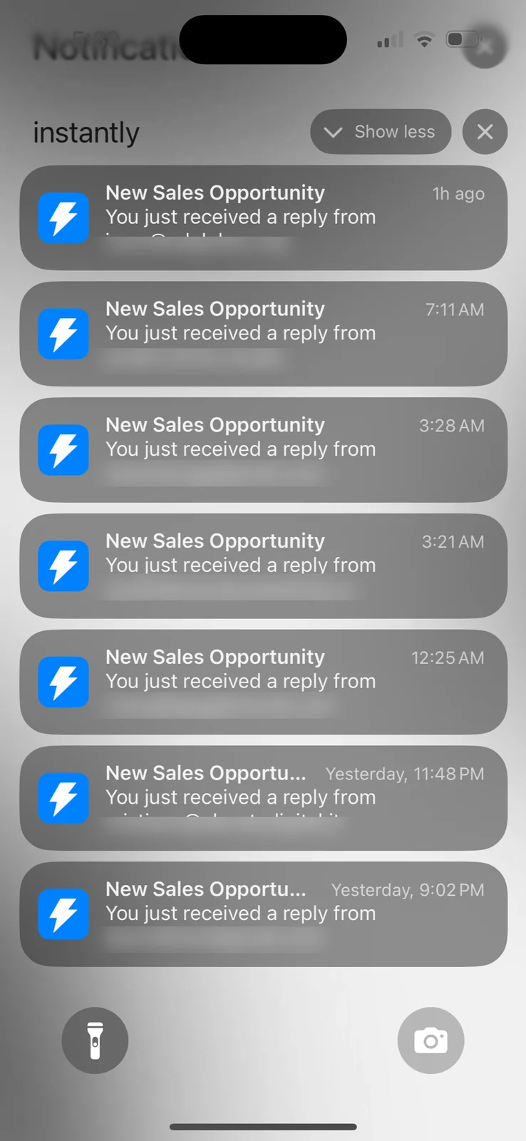 Phone screenshot showing Instantly new sales opportunity notifications (email addresses redacted)